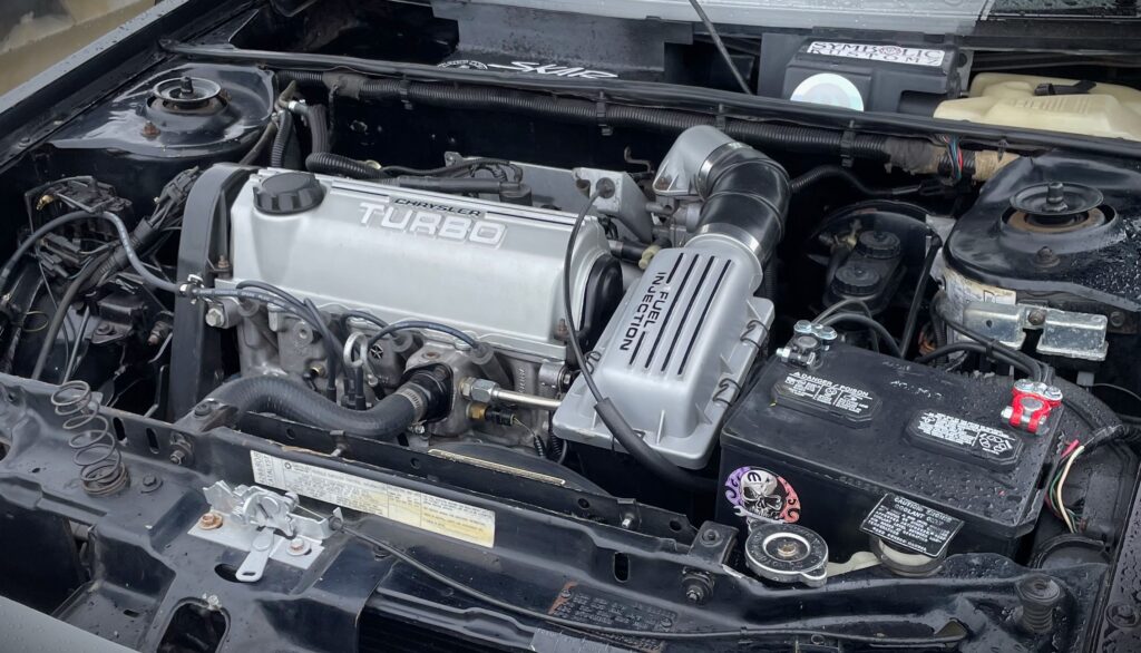 img_0102-1024x586-1 1985 Dodge Shelby Charger engine bay